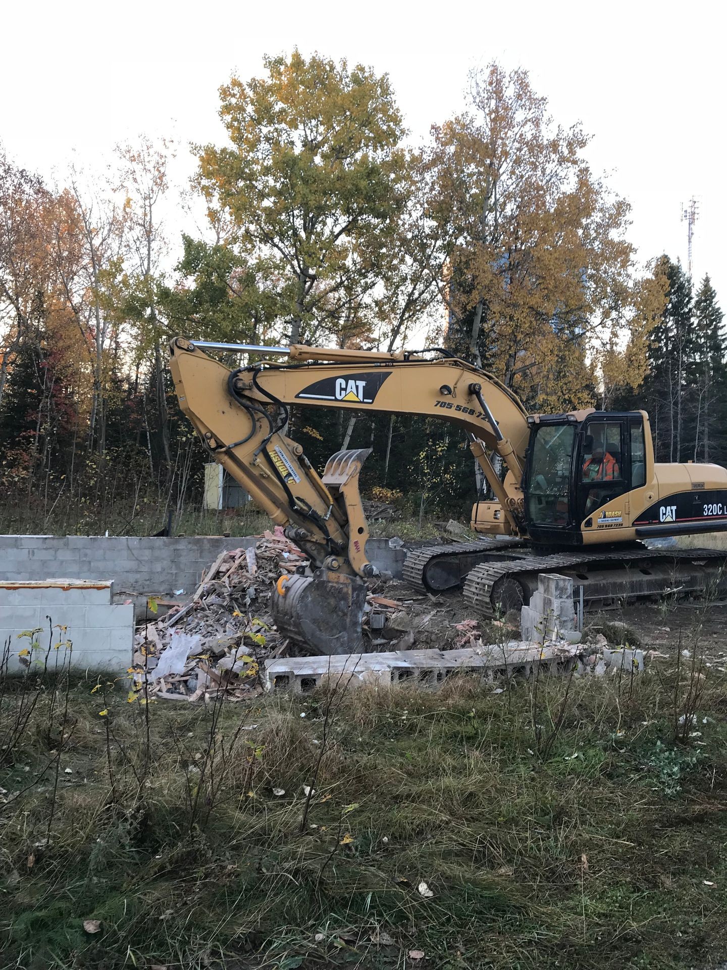 Demolition with the 320 Caterpillar Excavator
