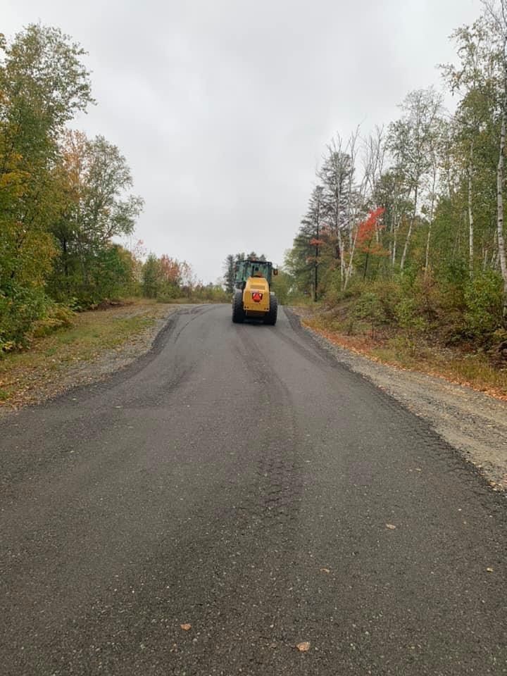 road resurfacing with roller
